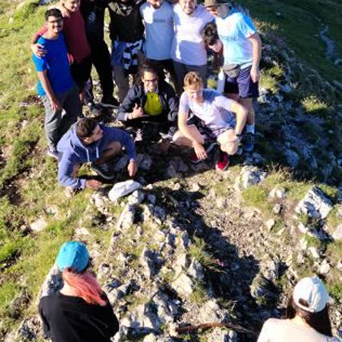 Kane with a group of friends on a mountain hike