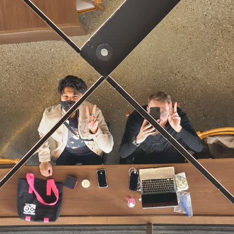 Mirror selfie at a desk setup